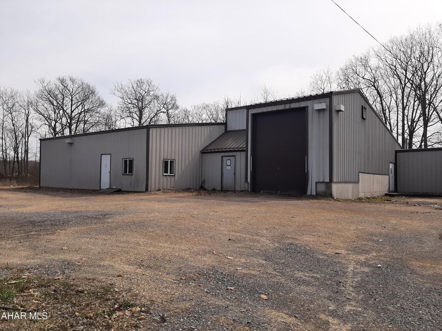 Come take a look at this 7000SF industrial site! This space is cleared out and ready for the next owners. There are multiple garage areas, shop areas, storage areas and even some office space. This industrial space offers, upgraded electrical, natural gas heat throughout, concrete floors, and large overhead doors. Abundant parking for a trucking fleet. There could be many uses for this space. Come take a tour and make an offer!