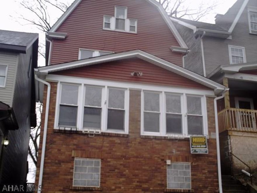 3bedroom home with newer furnace, hot water heater, electric and windows. Good roof and aluminum siding does have off street parking will need some inside paint and flooring.