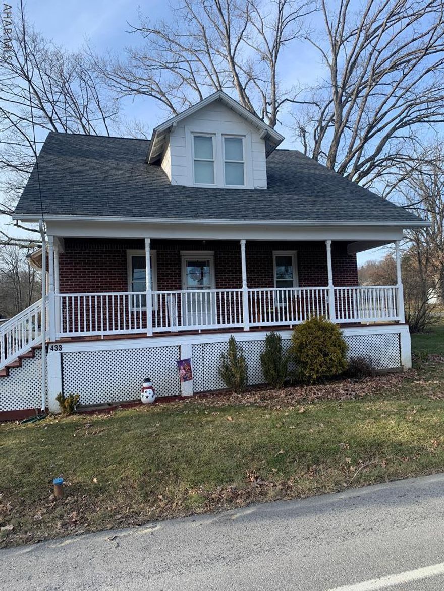 4 Bedroom with 2 Baths.  Large eat-in kitchen.  Enclosed back porch.  Plenty of room!  Newer roof.