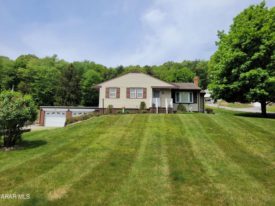 3 bedroom, 1 bath rancher with 2 car attached garage on .38 acre lot near Grazierville. Hardwood floors under carpet. Electric fireplace in living room. 3rd bedroom is currently used as a first floor laundry. Partially finished basement. Central air conditioning.