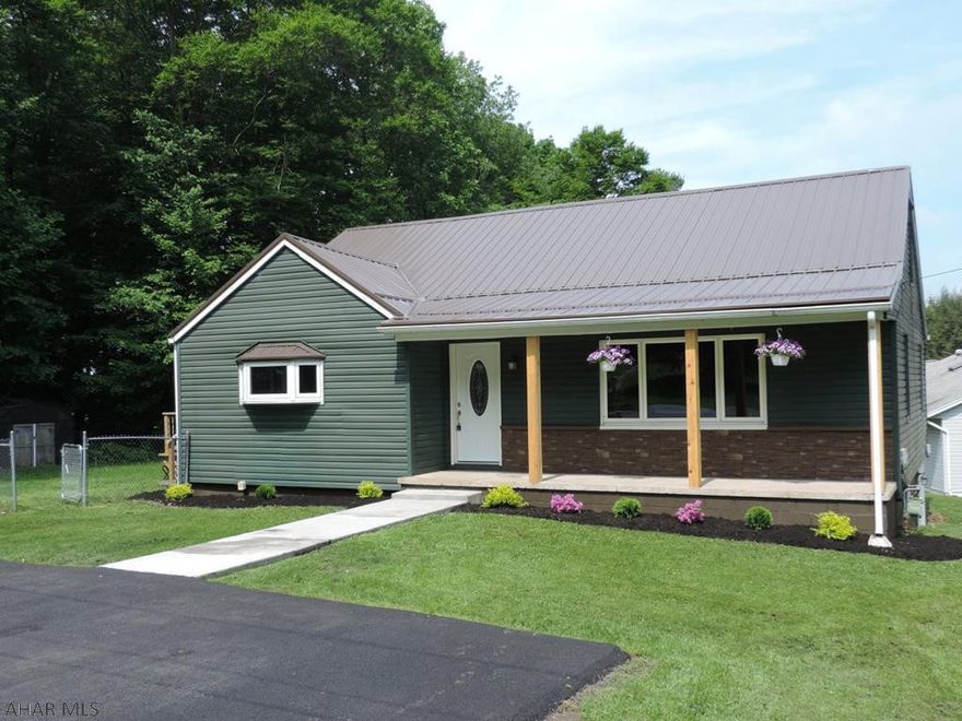 Renovated 4 bed 2 bath on large corner lot.  Large eat in kitchen with island and granite counter tops.  2 bedrooms on main floor with large walk in closets.  Walk out unfinished basement and newly paved drive way.  Yard partially fenced and large deck off kitchen for entertaining.