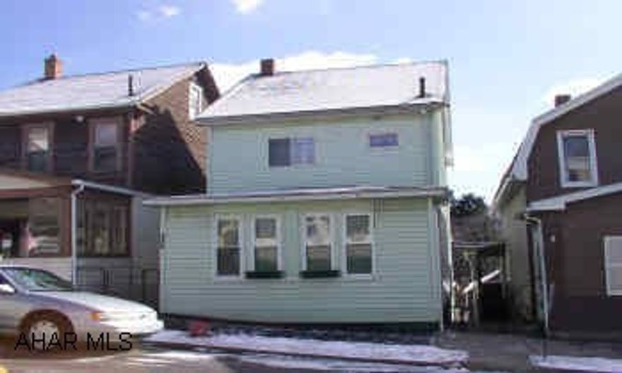 NO SHOWINGS UNTIL 2/17/2006.  Off-street parking.  New roof on one-story portion in back.  Heated sun room.  Heated finished attic which could be used as third bedroom. NO SHOWINGS UNTIL 2/17/2006.  Off-street parking.  New roof on one-story portion in back.  Heated sun room.  Heated finished attic which could be used as third bedroom.