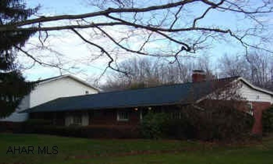 Brick rancher with beautiful great room addition country setting. Large level lot with fruit trees 3 care integral garage.