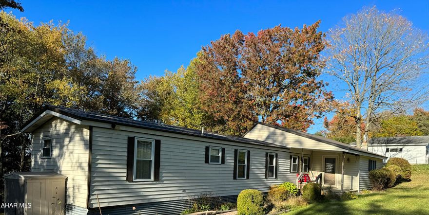 This charming piece of property in Portage Township won't disappoint.  Sitting on .43 acres, this 3 bedroom, 1 bath corner lot offers privacy in a quiet neighborhood.  Includes 3 outdoor sheds for extra storage.  This would make a great starter home! Call today to schedule a viewing. The refrig. that is included is the one on the outside porch, nor fridge in kitchen.