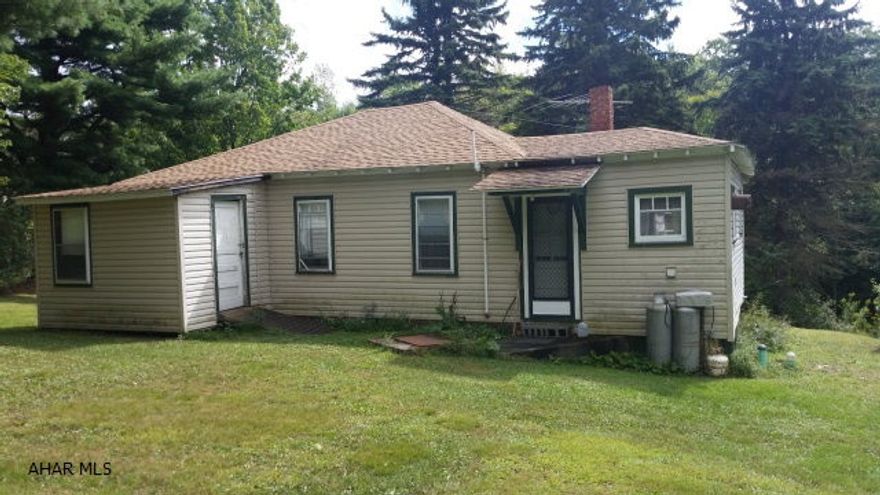 House is currently used as a Hunting Cabin..Could be a very nice home..beautiful country setting...many possibilities