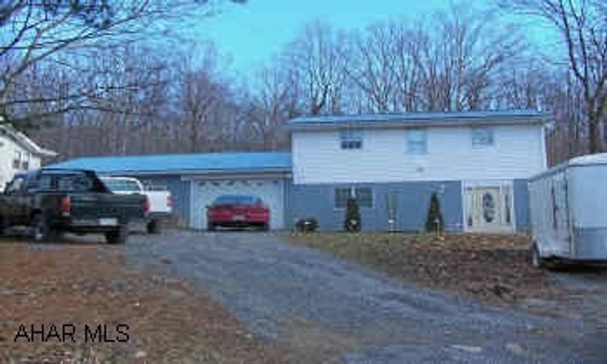 Nice 3 Bed, 2 bath, raised ranch oversized attached garage on almost 2 acres. Zone for business use close to new mall