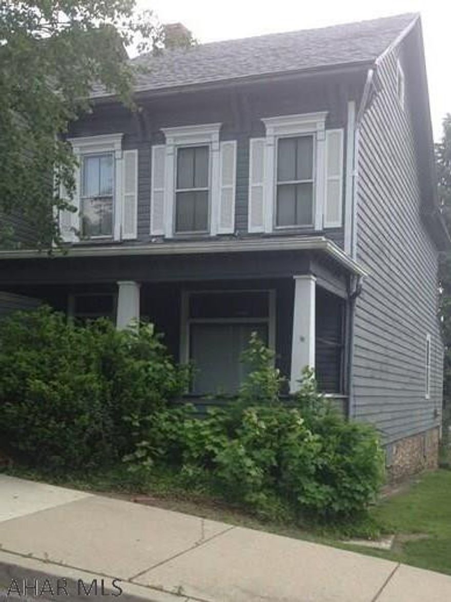 This is a great investment property or first time home buyer. Large rooms with large main floor. Possible 5th bedroom in attic.