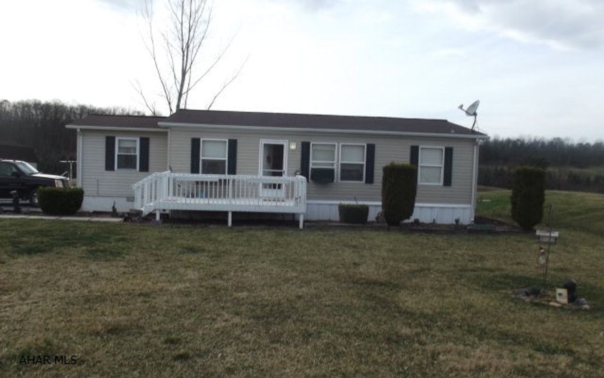 Nice level lot with beautiful views. 4 bedrooms with 2 full baths.