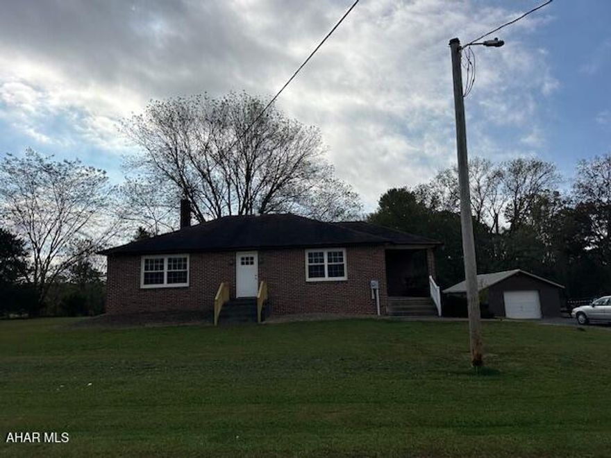 Beautiful open floor plan. Home offers 3 bedrooms, 1 bath, kitchen, dining area, living room. There are three heat sources in this home, electric baseboard, mini split unit that supplies heat and AC and wood/coal stove in the basement, plus one car detached garage. All of this on 1.09 acres lot.
