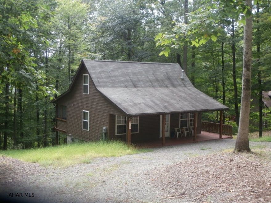 Beautiful 1.5 story home on large lot. AS New condition. Living room with woodstove and cathedral ceiling. Oak kitchen, loft area overlooks living room. 2x6 wall construction. Screened in rear porch and wrap around deck. Full basement with double door to store your golf cart or 4 wheeler. Additional 1.07 ac lot adjoining the property is available for $11,900. All amenities of Glendale Yearound available.