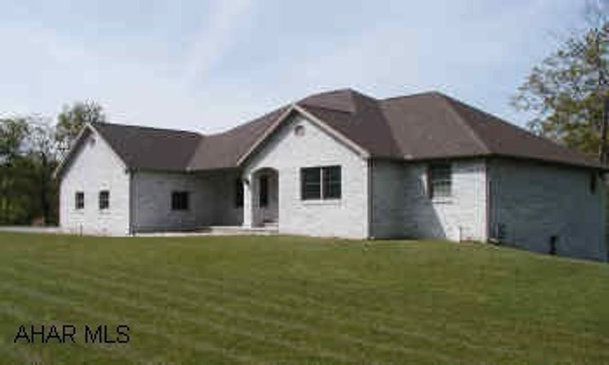 BEAUTIFUL 1 STORY BRICK W/ TRAY & VAULTED CEILINGS, SKYLIGHTS, OAK TRIM AND ARCHWAYS.  OPEN STAIRWELL TO DAYLIGHT, WALKOUT BASEMENT.  STATE OF THE ART GAS FUELED, 6 ZONE RADIANT FLOOR HEAT - EVEN BASEMENT AND GARAGE.  LARGE LOT, GREAT VIEW.