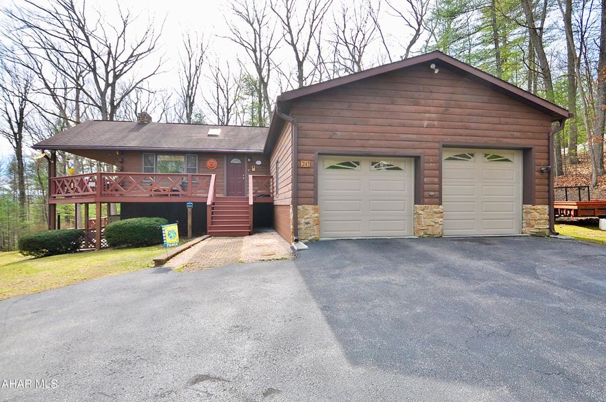 Unbelievable and one of a kind hillside ranch style log home ensconced in the hidden and private development Shenecoy Manor, just outside of Huntingdon and accessed by Raystown Road. Serene and private setting. This is a great place to make yours and enjoy. Partially finished lower level includes an office and 1/2 bathroom, and walks out to the rear yard and greenhouse. Impossible to see unless you are there. If you are looking for a place to disappear to, with access to shopping and the wonderful Borough of Huntingdon, then this is the home for you. See it soon or it will be gone!