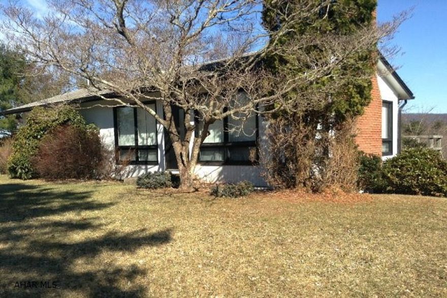 Country living at its best... This property has it all. Gorgeous pond and stream, view, designer interior and one floor living on 20 private acres. Large windows surround the living room-dining room combination and cathedral ceilings add great appeal to the space. A master bedroom with en suite bathroom and main floor laundry room adds great convenience. Watch the attached visual tour to truly appreciate this incredible home.