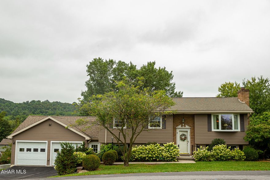 Welcome to 725 Orchard Drive — a meticulously maintained, thoughtfully upgraded home in the desirable Penn Farms development. Offering a rare blend of craftsmanship, comfort, and low-maintenance living, this property is far from ordinary and ideal for those who appreciate quality over quantity.

Step inside to discover a warm and inviting floor plan highlighted by an enclosed four-season porch — complete with radiant heated floors, custom handmade cabinetry, a wet bar, and direct access to a maintenance-free composite deck. It's the perfect spot for morning coffee, evening cocktails, or game-day hosting.

The oversized 670 sq ft garage (added in 2018) easily fits two large vehicles with ample room for storage or a workshop. Additionally, the original 487 sq ft garage has been transformed into a versatile bonus room — ideal for a home office, studio, gym, or lounge.

The home's mechanical systems are updated for efficiency and peace of mind, including a Burnham cast iron boiler with indirect hot water heater, plus cooling units from Lennox and LG. A gas fireplace in the family room adds a cozy touch during the colder months.

The property's landscaping has been thoughtfully designed with mature trees to create privacy, seasonal beauty, and strong curb appeal. A 4-foot no-maintenance white vinyl fence surrounds the backyard, offering a private, secure space for pets or outdoor enjoyment. A matching storage shed adds even more utility.
Located in a quiet, well-maintained neighborhood with limited turnover, this home is move-in ready and offers a unique value in today's market.