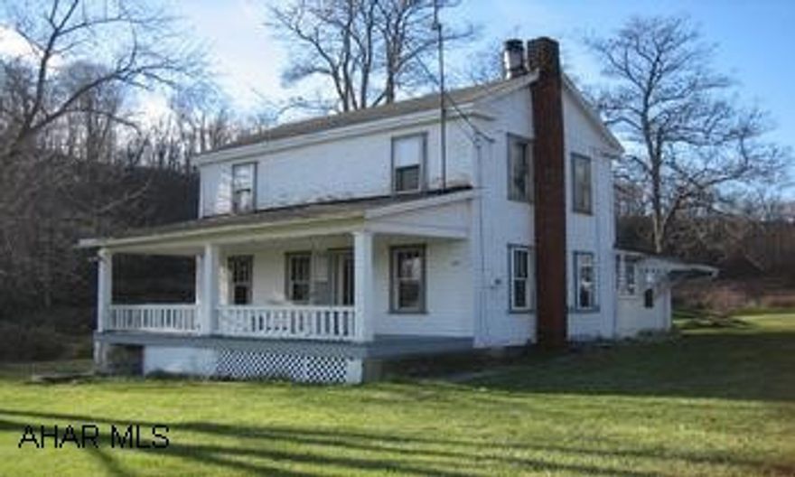 Three bedroom farmhouse with plenty of acreage.  Relax in front of the fireplace or enjoy the 20 acres of partially wooded peaceful atmosphere.  Great area for hunting or the equestrian in you.  Ask for Lacy.  Sold as is. Three Bedroom farmhouse with a cozy fireplace and peaceful 20 acres for your enjoyment.  This property boasts a tranquill atmosphere with a stream.  Tinker in the spacious outbuilding or make it a new home for your horses.  Ask for Lacy.  This won't last!!! Sold as is.