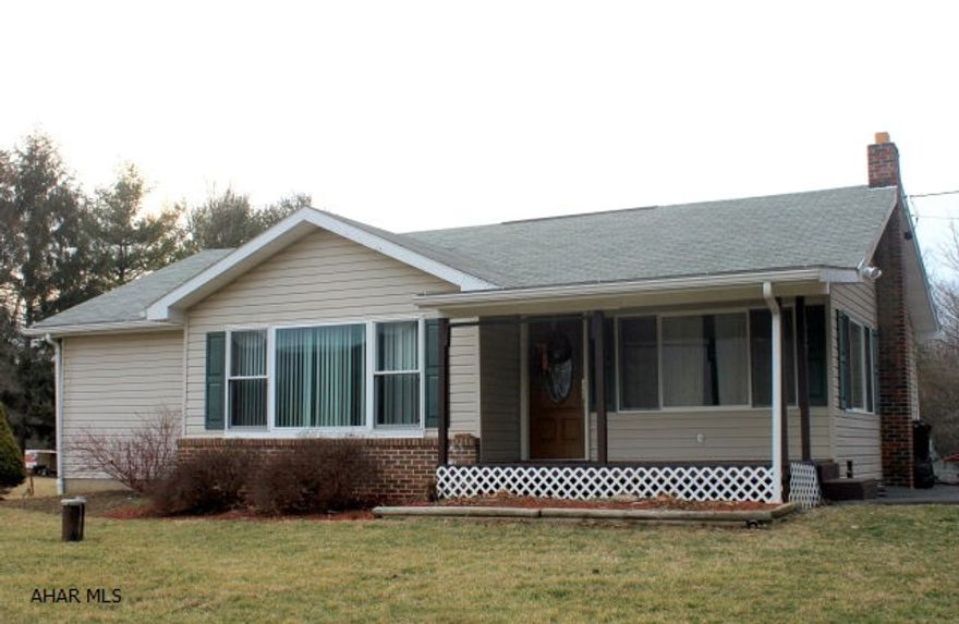 Wonderful setting for this ranch home situated on 4.5 acres in Snake Spring Township. Updated kitchen, appliances included, exits to back patio.  Spacious living and dining areas.  Newer laminate and carpet throughout the home.  Renovated main bath with first floor laundry.  Huge 20x23 master addtion with private bath and access to back patio.  1+ integral garage, OFA heat with additional wood stove and 24x30 barn.