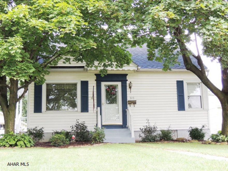 Simply unpack-move right in! Meticulously cared for, 1 1/2 story in Garden Heights.  New & awesome kitchen w/HW floors & stainless steel-like appliances that stay! Updated baths as well.  Double lot is fenced in & has playset already for the kids!! Nicely landscaped w/perrenials.  2 car detached garage.