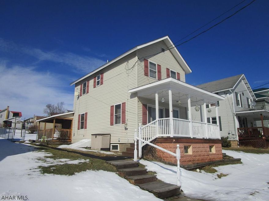 Nicely remodeled two story vinyl sided home featuring 2 bedrooms, modern bath, modern kitchen with appliances, large dining room, modern living room and laundry room off the kitchen.  Fenced in rear yard with storage shed accessed from rear alley. Oil FA heat with central air. Estate house.