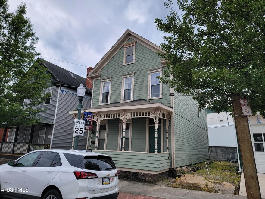 2 story, 3 bedroom home with 1 1/2 baths in convenient location. Modern kitchen. Decorative fireplace in living room. Freshly painted inside. New roof. Attic has potential for additional rooms.