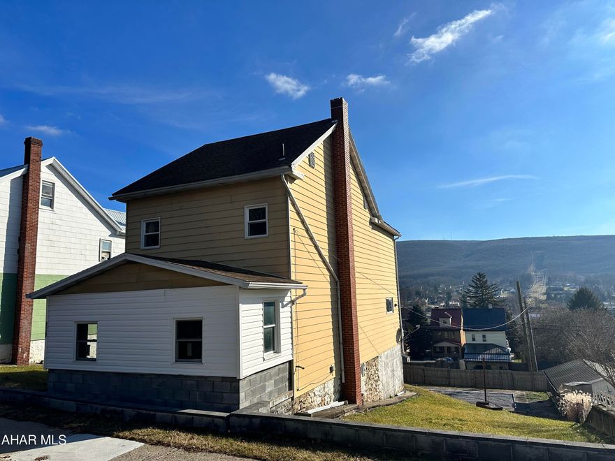 This 3 bedroom home sits on a large 74x120 lot, with bonus room on the 2nd floor that could be used as a home office, gaming room, etc. Enjoy new windows, heated attic, and off street parking. Priced to make updates and personalize as desired.