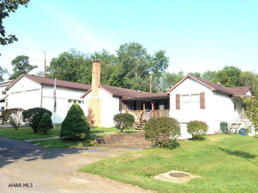 3 bedroom ranch home with spacious rooms on 1/4 acre. Large living room with wood burning fireplace. Plenty of closet space. Hardwood floors under carpeting in original part of house. Forced air gas furnace. Oversized 61' x 27' garage with ample space for RV, vehicles and a large workspace. Unique property in a nice location and move in ready!