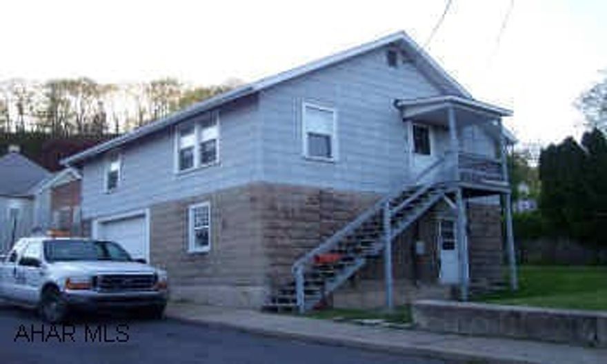 apartment above garage Great starter home or currently used as a rental