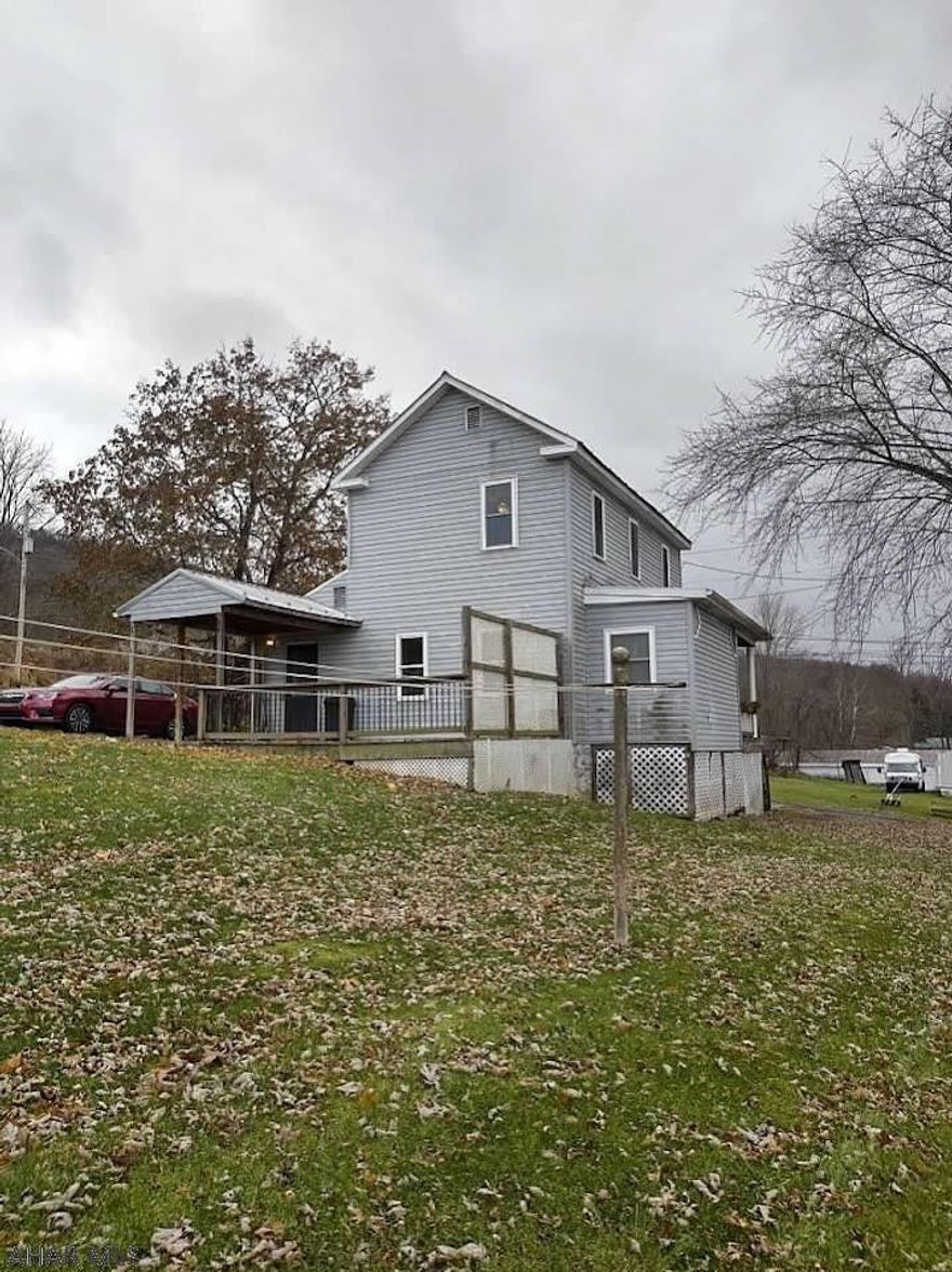 Ready to buy?  Check this house out.  Beautiful inside - new plumbing - new electric, new windows and new flooring throughout. The kitchen has beautiful cupboards - plenty of space for all of your things. Kitchen - Dining Room - Living room open Laundry Room is very spacious.  Bedrooms are nice sized. 2 full baths. Nice sized yard - shed in the back of the property... Deck on the back of the house. Move in ready.