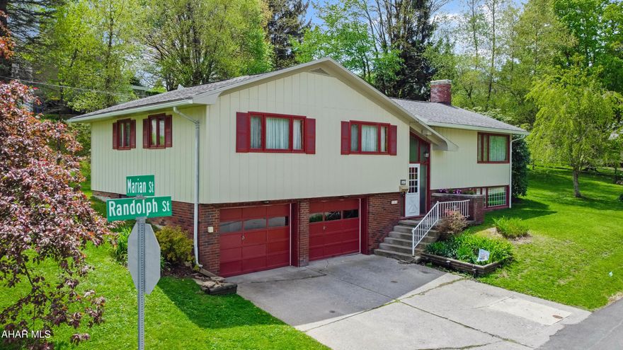 Welcome to 500 Randolph Street, a charming residence in the heart of Ebensburg Borough, situated on a private lot overlooking the fairgrounds. This well-loved, one-owner home was built in 1966 & has been meticulously maintained throughout the years. On the main floor, you'll find a spacious living room, a formal dining room, a well-appointed kitchen, a convenient half bathroom, four generously-sized bedrooms & a full bathroom. The cozy sun porch invites you to relax & enjoy the serene surroundings. The basement offers a beautifully finished living area complete w/ a wood-burning fireplace, a full bathroom, & a laundry room, along w/ access to the integrated two-car garage. You'll also appreciate the ample storage space available. Nestled on a large corner lot, this property features off-street parking & a comfortable yard, making it perfect for outdoor activities & entertainment. Discover the potential & charm this home has to offer. Call today to schedule a viewing!