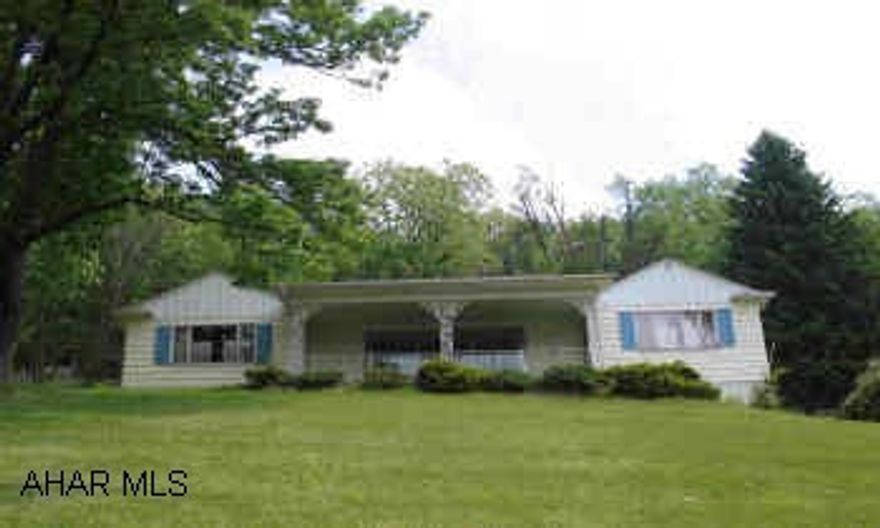 Ranch hilltop home with view-accented charm. Large yard, covered front porch, flagstone patio, 2 fireplaces, hardwood flooring and carpeting. Tax ID # F9 E3-2, F9 E3-3 and E9 D3-17