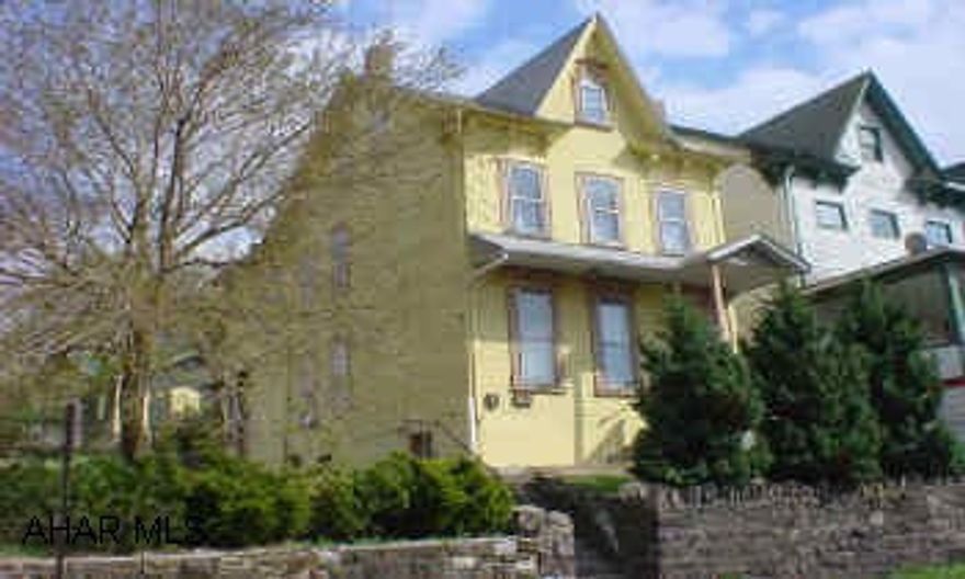 2 1/2 story frame on a double corner lot. Newer roof and sheating. Duplex, 2nd floor has 2 bedrooms and full bath. 1st floor has new bath. Good mechanics, very clean inside and a usable garage. Worth the look!