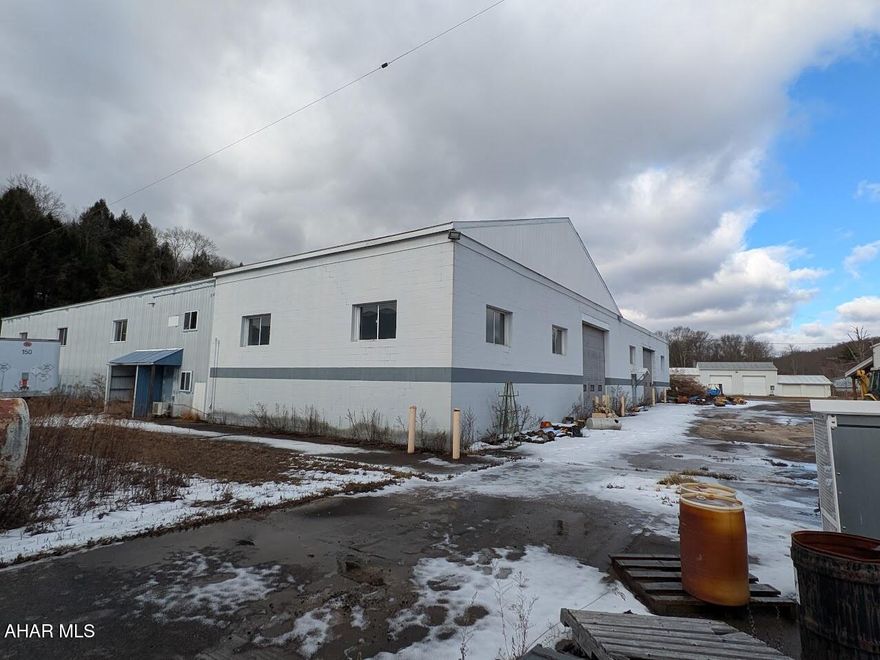 Former Apex Hydraulic & Machine Inc. site in Clearfield County, PA, featuring multiple parcels and buildings totaling approximately 20,000± SF on 5.89± acres. Prime location with extensive road frontage and just 10 miles from Interstate 80. Owner is open to selling separately: Parcel 152 for $700,000 and Parcel 158 for $1,100,000. Ideal for industrial or commercial use.