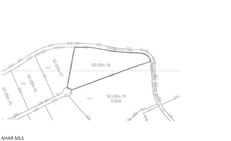 Choose your view!  This 3.03 wooded acres overlooks all of Warriors Mark Valley.  Build your dream home and become a part of this highly sought after and  esteemed community.  Centrally located between Altoona and State College.