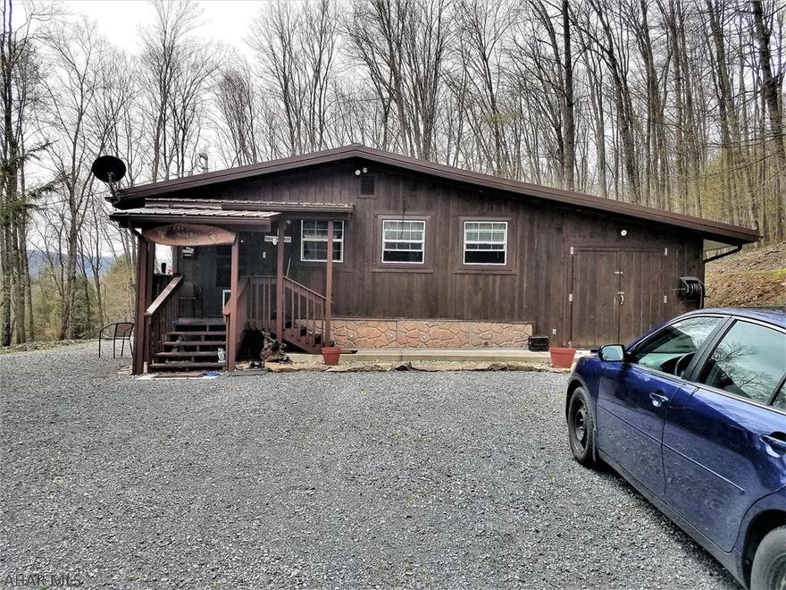 Are you ready for the quiet country life?  Then come and check out this charming ranch home.  Totally remodeled in 2006, this home offers convenient one floor living.  The kitchen, with an eat in dining area, combines with the living room for an open concept floor plan.  The primary bedroom contains a walk-in closet.  The bathroom/laundry room is spacious.  You can sip your coffee or tea on the covered porch and listen to the sounds of nature.  This cozy gem is conveniently located approximately 1/2 way between Bedford, PA and Cumberland, MD.  It allow easy access to Shawnee State Park, Interstate 68, Rocky Gap State Park and also State Game Lands.  Come take a look, it may be the place for you.  It could be a great weekend getaway or a permanent residence.