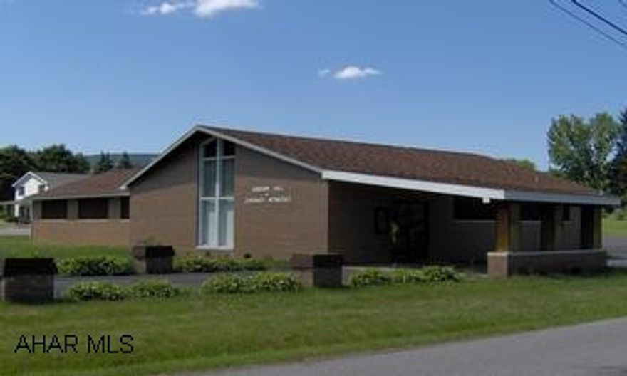 Almost 4000 square feet and generous parking - unlimited possibilities! Great setting near Tipton. Rooms include: lobby, coatroom, conference room, library, 60x35 auditorium, restrooms and lunch room. Almost 4000 square feet and generous parking - unlimited possibilities! Great setting near Tipton. Rooms include: lobby, coatroom, conference room, library, 60x35 auditorium, restrooms and lunch room.