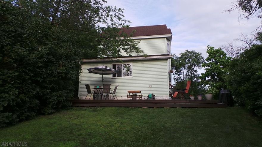 Nice home on 3 city lots - privacy in the city - updated kitchen includes stove, dishwasher, washer & dryer. Remodeled baths. Private driveway.