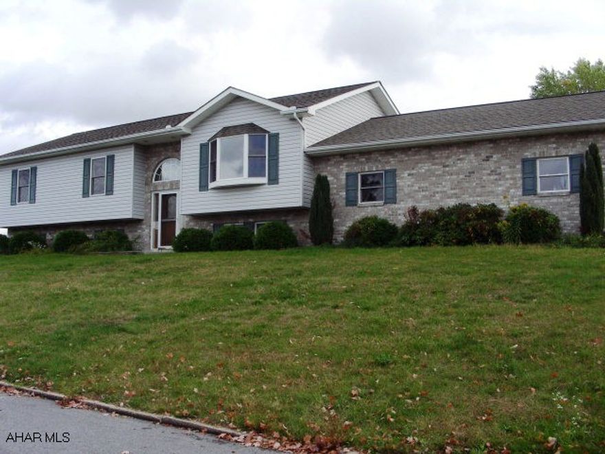 See agent for Purchase Contract Addendum.  Large corner lot.  Lots of kitchen cabinets.  Entrance from garage into kitchen or basement.  Some hardwood floors.