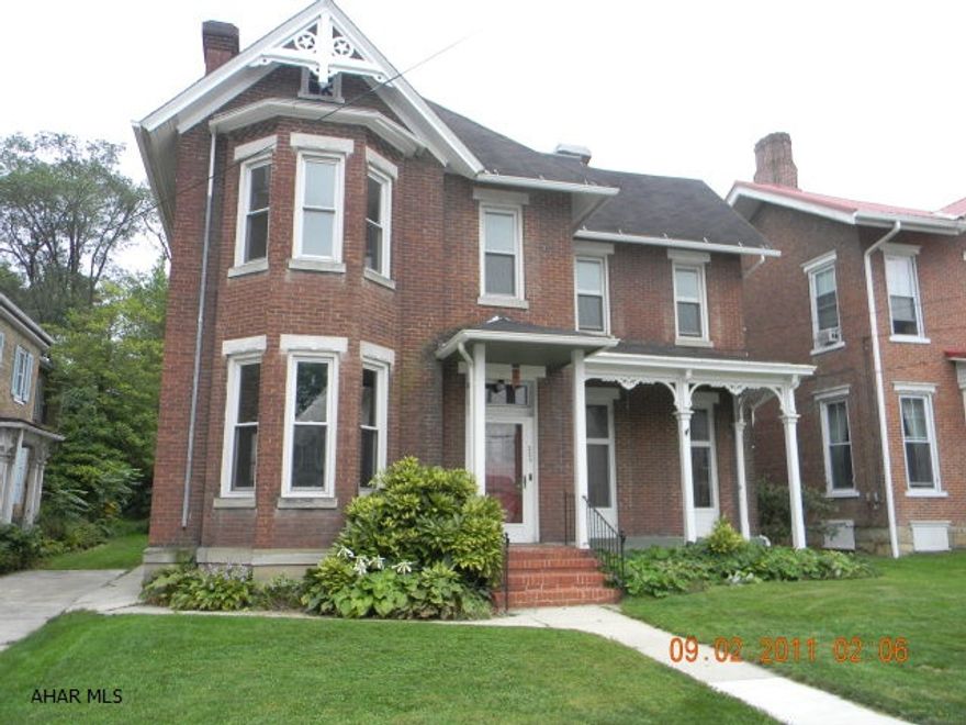 Roomy brick victorian in the historic Bedford Borough.  Lots of character with several fireplaces, french doors and an open staircase in the foyer.  The main level of the home offers a living room, dining room, kitchen, a den/office and full bath.  The second level has four bedrooms, a laundry area and full bath.  The third level is a finished attic with a bonus room.  One-car detached garage, full basement, oil hot water heat, kitchen skylights, shingle roof and mostly thermo pane windows.  Good brick construction.