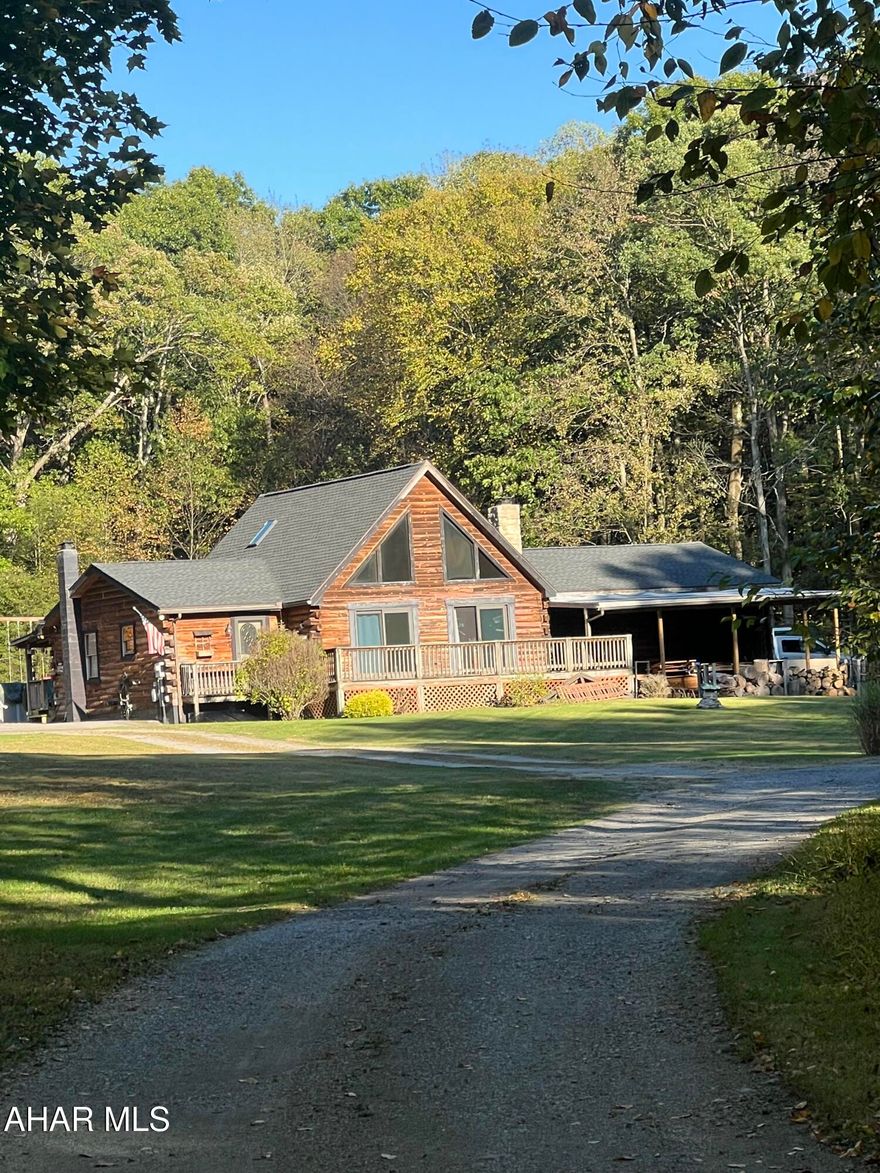 Are you looking for a beautiful, secluded log home in the Glendale School District?  Look no more, this large home is located minutes from the lake and state park.  This 3 bedroom and 2 1/2 bath home has plenty features for any family.  It has a loft that could be made into an extra room as well.  Sitting on 5 acres of ground with your own private drive.  It has an outdoor wood furnace as an additional option for heating and a very spacious two car garage.  It comes with a water softener system already installed and paid for. Theres plenty more, you just need to see in person.  Come check out your dream home before it is gone.