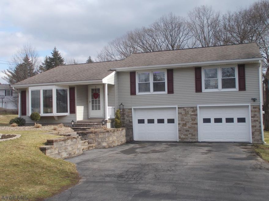 Beautifully decorated and landscaped home!  Great neighborhood! All you need to do, is move in!  This home offers 3 nice sized bedrooms, 1 full and 2 half baths, CA, newer stainless appliances, counters and backsplash, 2 car garage, open living area and rear patio.  A definite must see home in the HASD.