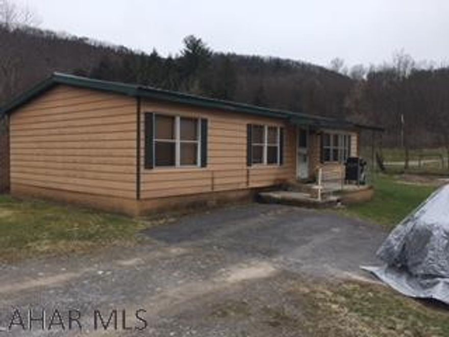 A rare opportunity to own a piece of the world famous fly fishing destination known as Spruce Creek! A limestone spring creek, with an amazing array of insect hatches, creates the ultimate environment for the brown trout. Located about 20 miles SW of State College, this 2.2 acre level lot has easy access to LR 45, and enjoys over 500' of frontage along Spruce Creek. It adjoins a 35 acre tract owned by the Pennsylvania State University, and includes a 3BR 1BA modular on foundation and an (unused) log cabin style cottage. Check the hatch report, grab your reel and box, and get ready for fly fishing heaven!