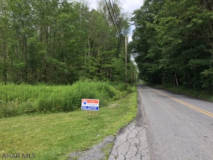 Beautiful piece of property in a semi rural area. Gently rolling to flat tract of wooded ground on the edge of Patton Borough. Property has road frontage along both Beech Road and Magee Road. Municipal water and sewer are available along Beech Road.