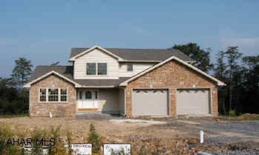 Rear sunroom, vaulted LR ceiling, 1st floor laundry, 1st floor bedroom suite/bath. Unique floor plan with first level master bedroom suite, 3BRs on second level