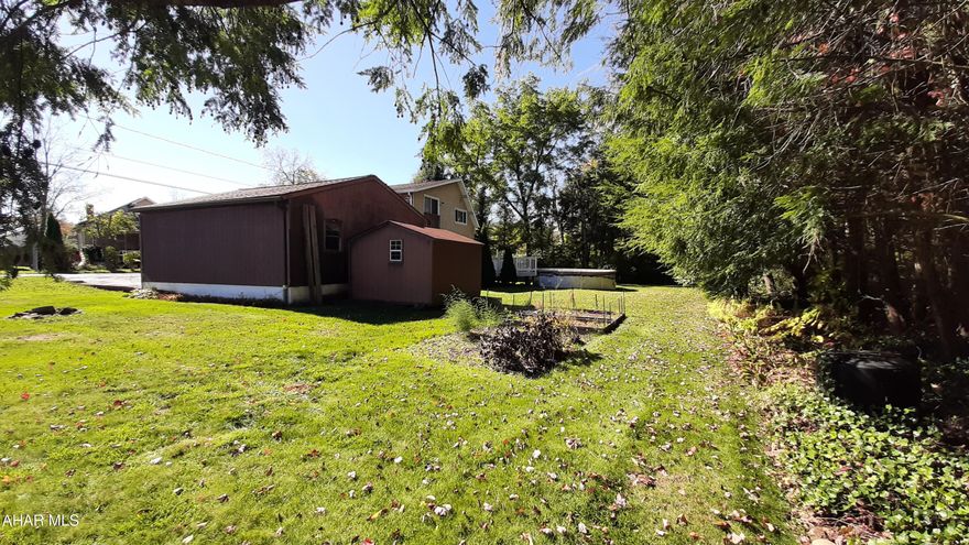 Nice flat lot being sold with the neighboring house at 1416 Caldwell Ave. Portage. It will not be sold separately. MUST SELL WITH THE HOUSE.