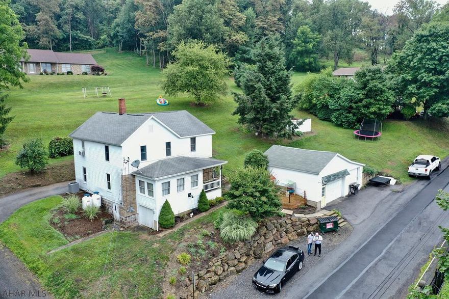 This is a large 2 story home on an approx half acre lot in Hastings Borough.  The home is situated on a hill with great views!  The home is updated with new flooring throughout!  The main level features a mud room, a formal dining room, living room, large kitchen and laundry room with full bath.  The second floor has four bedrooms and a full bath.  The home has a newer heat pump (approx 3 years old) with propane back-up.  Other property features include an attached 1 car garage and large detached garage with a loft for storage.