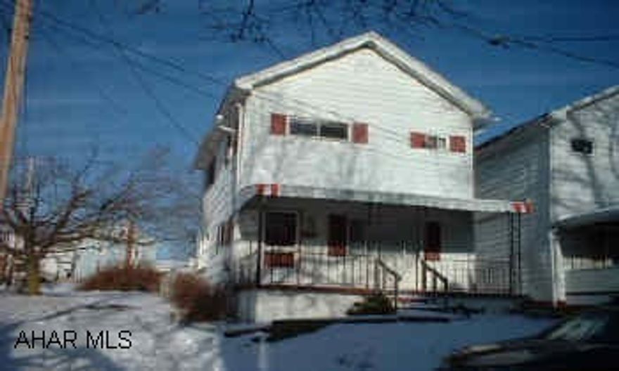 Foreclosure - needs TLC - corner lot, off street parking.