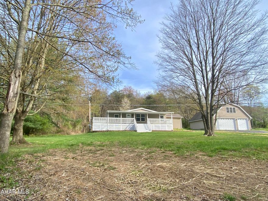 Located on a private road with over half an acre this fully renovated home is waiting for you.  The first floor features an open floor plan with 3 bedrooms and 2 full bath.  The basement features an additional bedroom with rec and bonus room.  The detached garage has endless potential.  Unfinished space is perfect for extra income, a rec room, or just storage.  FURANCE LESS THAN 7 YEARS OLD AND NEW AC, NEW WATER LINE TO HOUSE!!A property like this will not last long!