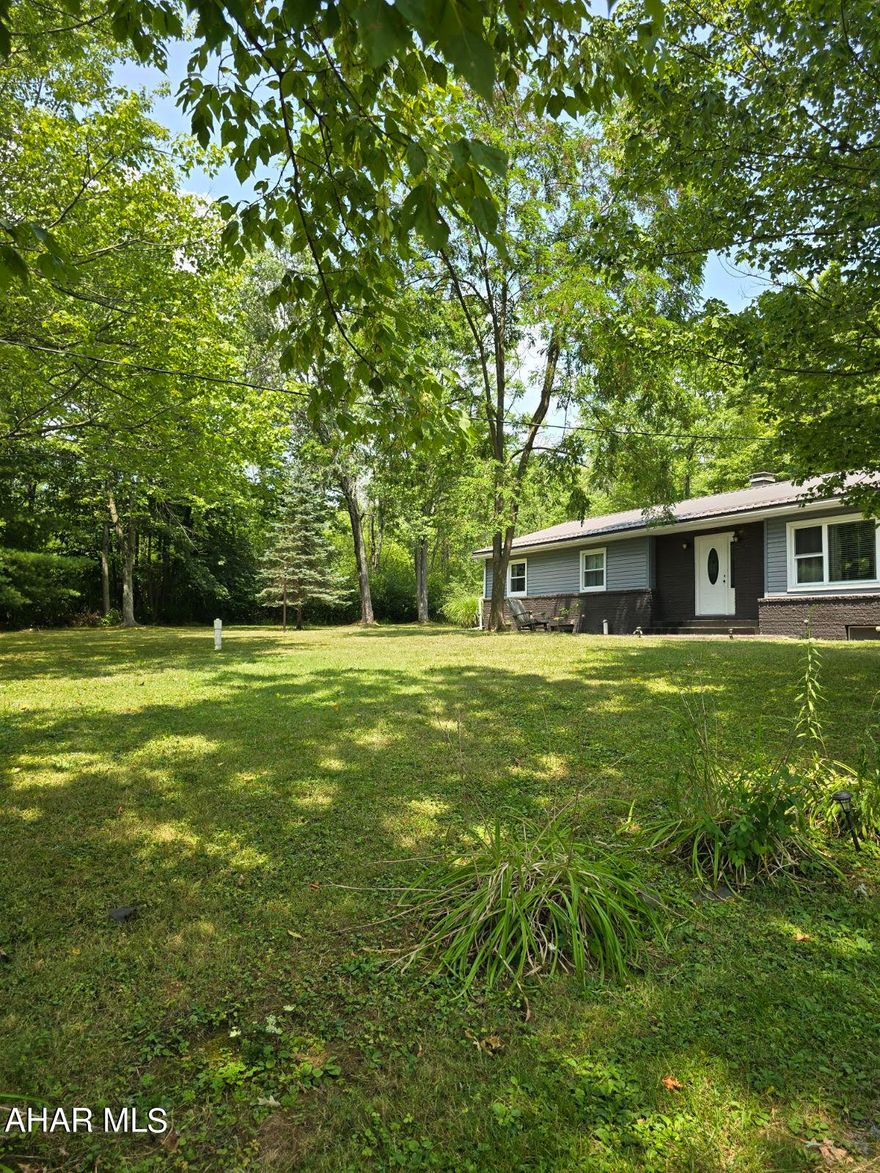 Welcome to this three bedroom charming home located near Penn State Altoona campus. Enjoy evening walks around the neighborhood or a short stroll to the pond. Enjoy a cozy evening in a private wooded setting with the fenced in yard and firepit. This home is ready for you!
