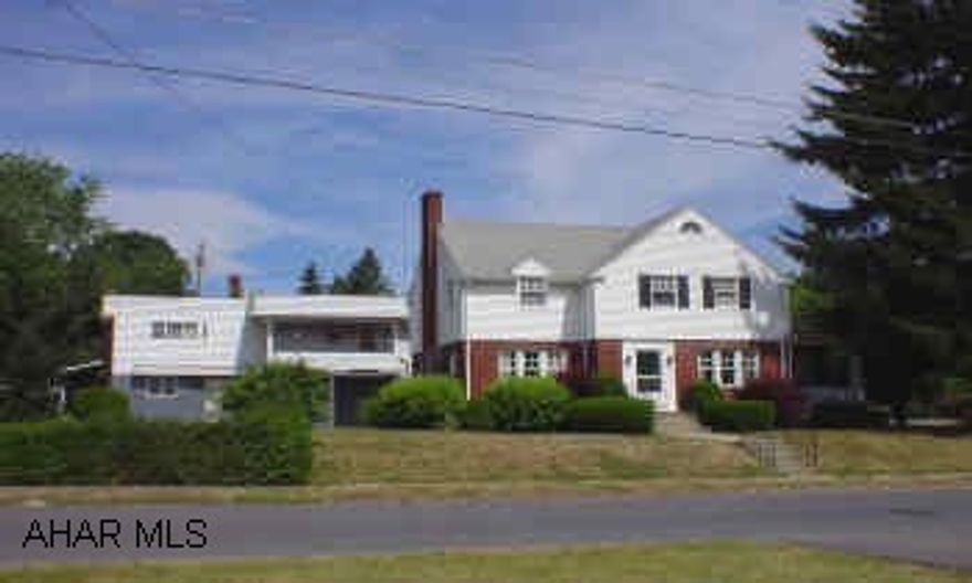 2 1/2 story brick beauty on corner lot with 3 bedrooms, great condition, all hardwood floors, new furnace installed. Detached 2 car garage with apartment overhead.