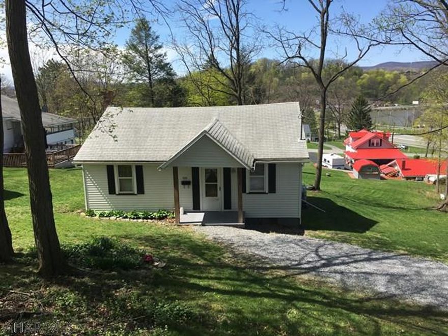 1 Story house in Lakemont, 2 bedroom, 1 bath, newer furnace, double lot. Low Taxes!!! Would make a great rental property.