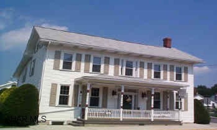 Very nice,  spacious home. Unique property suitable for family living or investment. Licensed for B&B. Thriving fully equipped baking/snack shop business. Convenient, visible location near park, shops, churches.   Loads of storage, addl kitchen, covered patio, office, first floor laundry. Updated, but quaint bathrooms, additional room for 2nd floor study or sitting area off master bedroom. All vinyl siding and replacement windows. Plenty of parking and outside eating area for patrons.